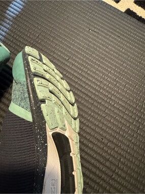 Under Armour Mint Green Athletic Sneaker with Black Speckled Midsole